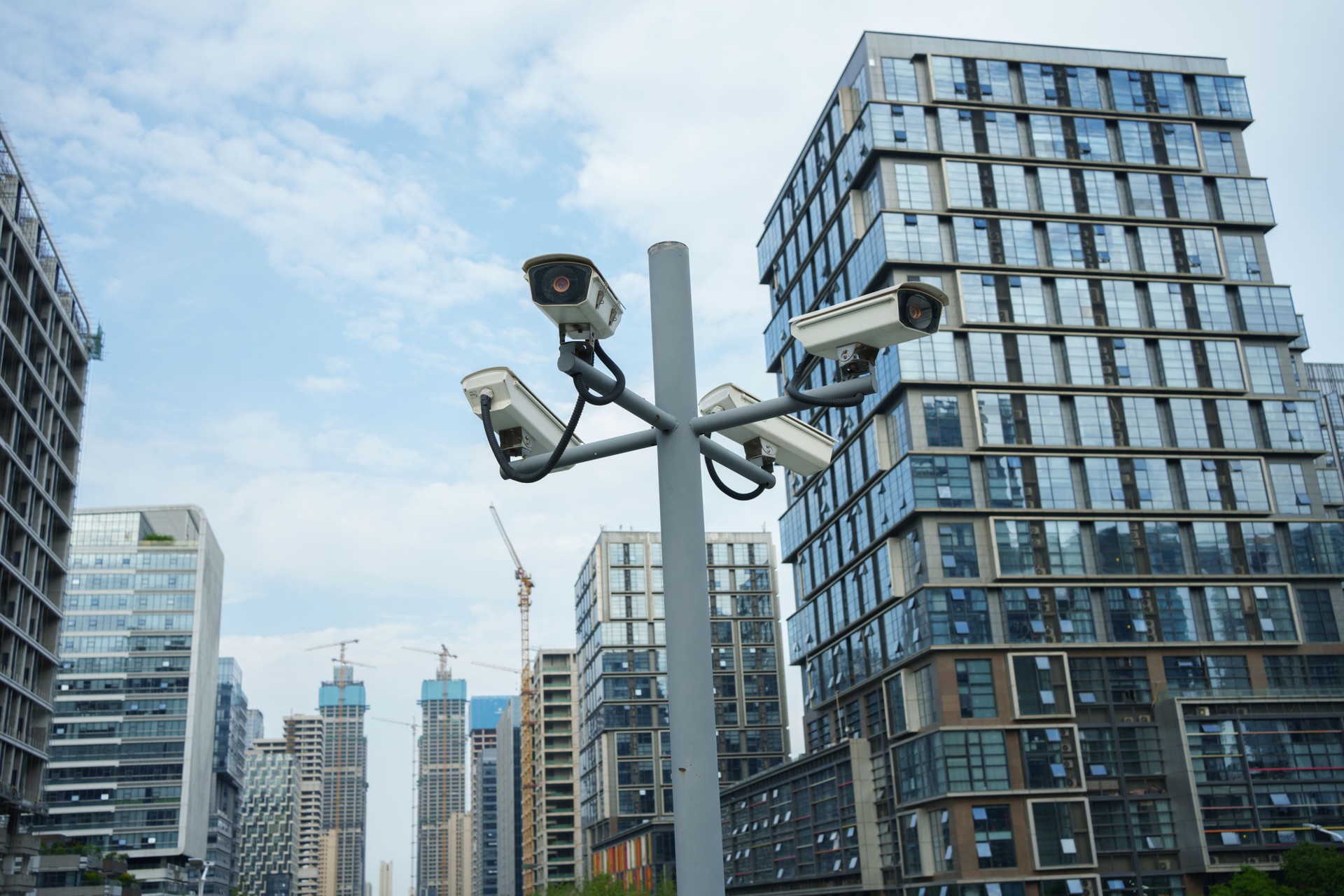 Facial recognition camera on city street